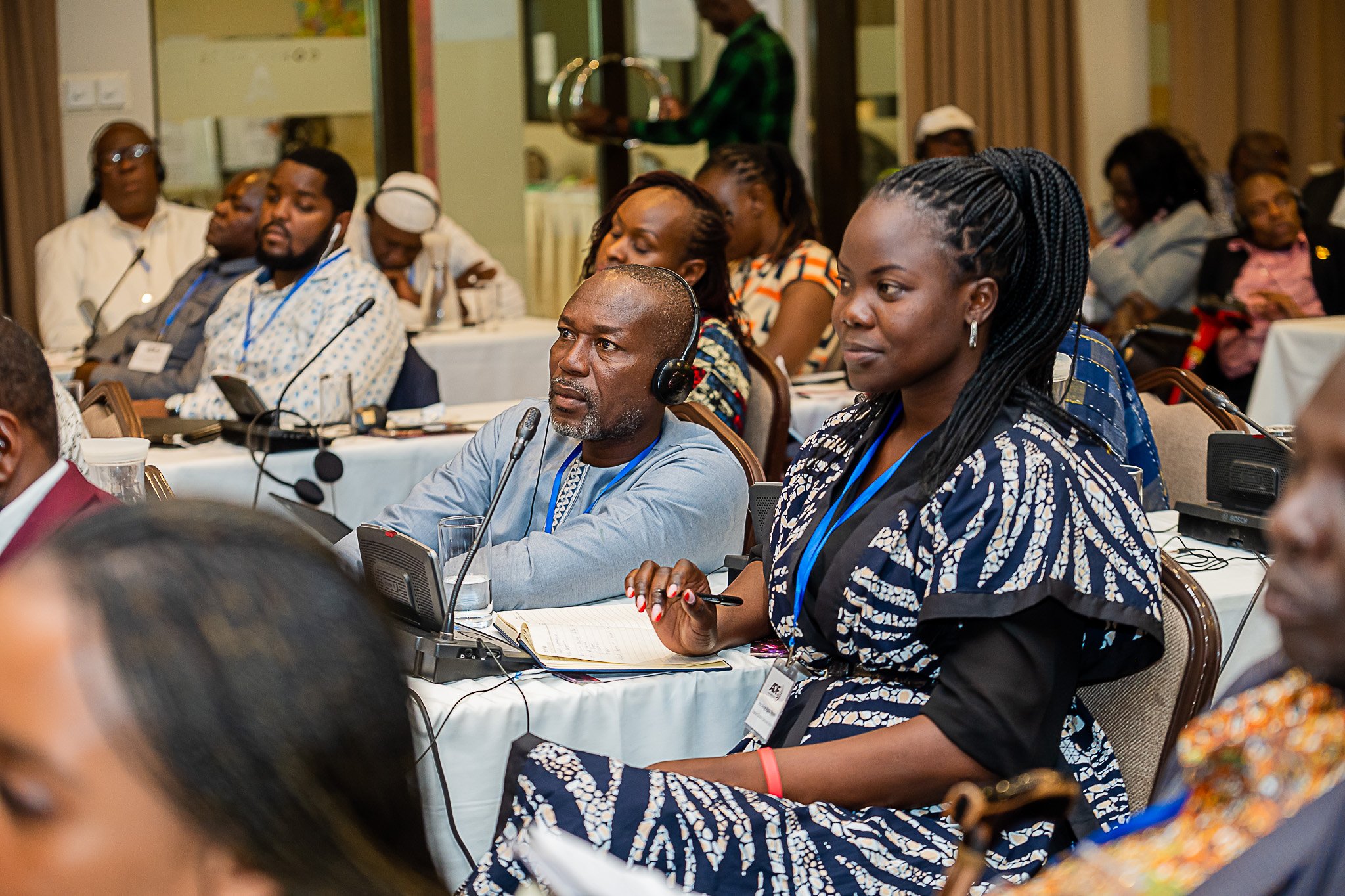 Image 1: OPD members in the audience participating enthusiastically at the session.