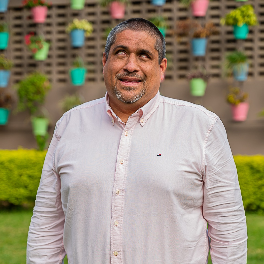 Image 5: Headshot of José Viera smiling