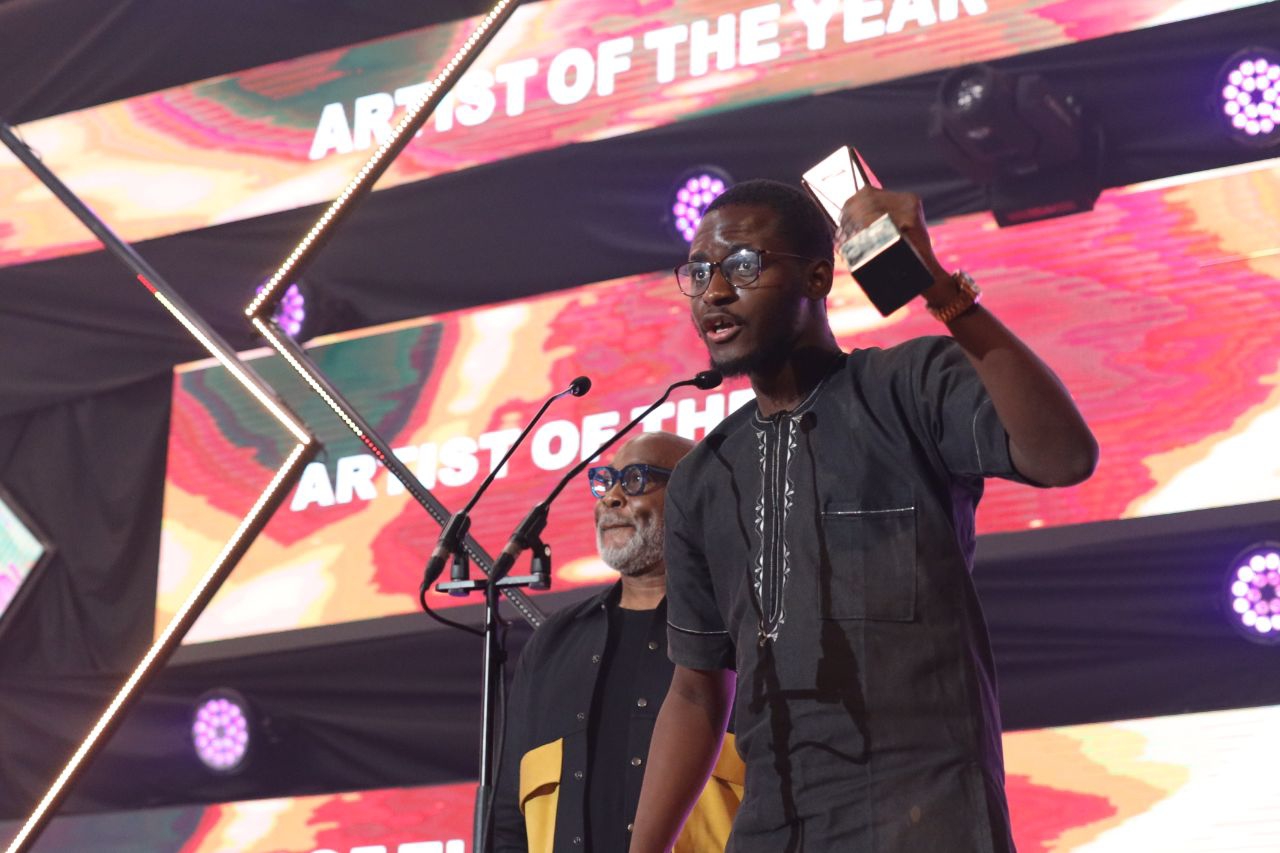 Murphy accepting award on behalf of Burna Boy