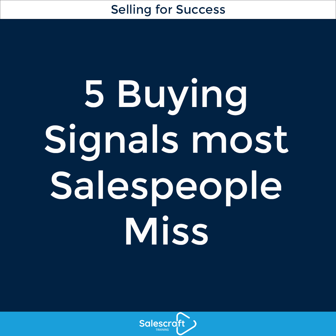 A salesperson being coached after a sales call