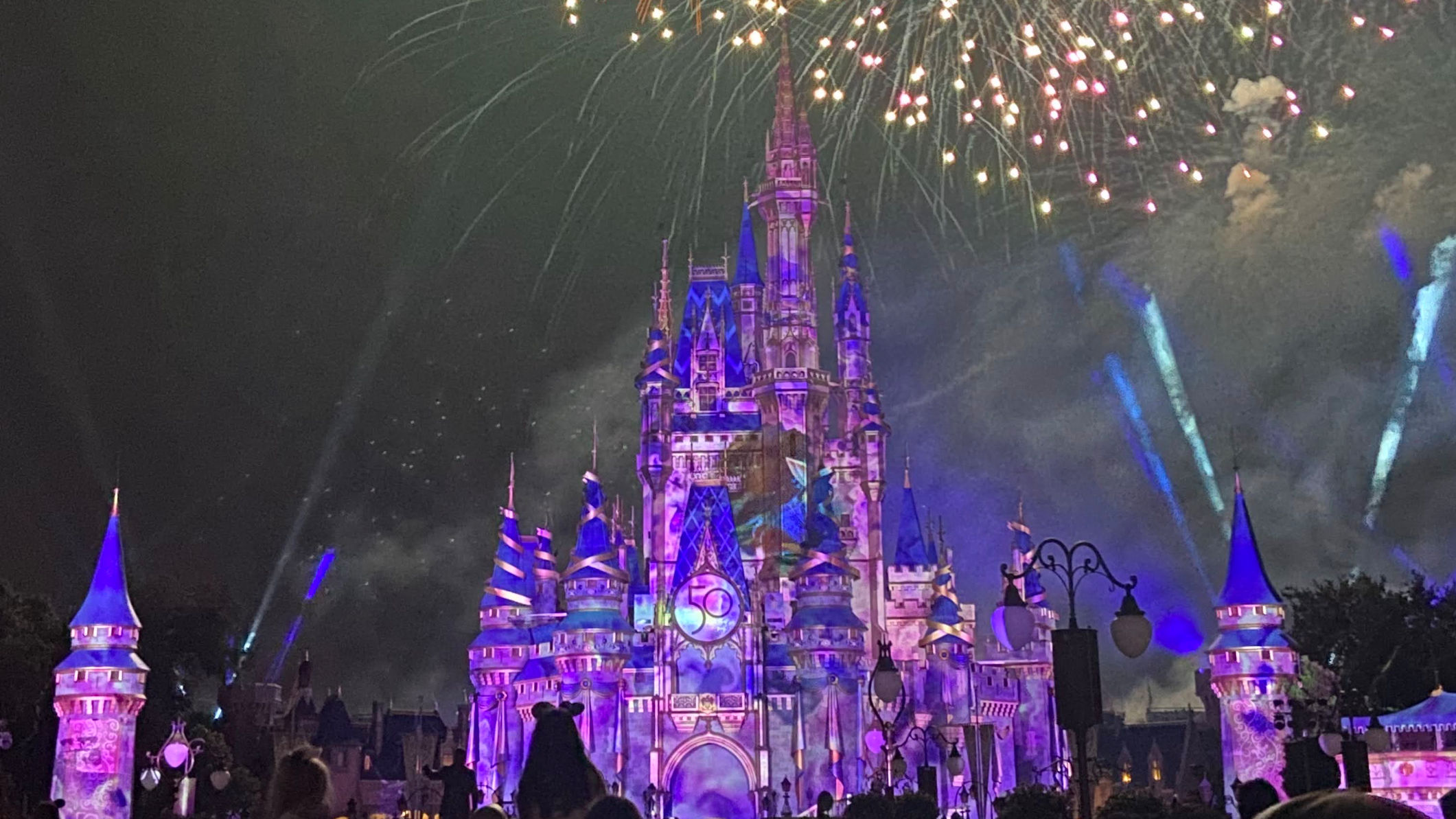 Cinderella Castle glowing at night at Walt Disney World’s Magic Kingdom. The iconic centerpiece of a Disney vacation, captured during a trip planned with a certified Disney travel expert.