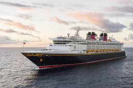 Disney Magic cruise ship docked at port, part of the Disney Cruise Line fleet. A magical vacation option planned by a certified Disney travel expert based in Wisconsin.