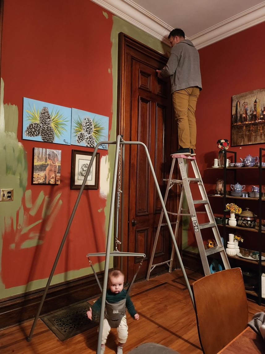 Stefan painting the dining room in the David Enoch Beem House.