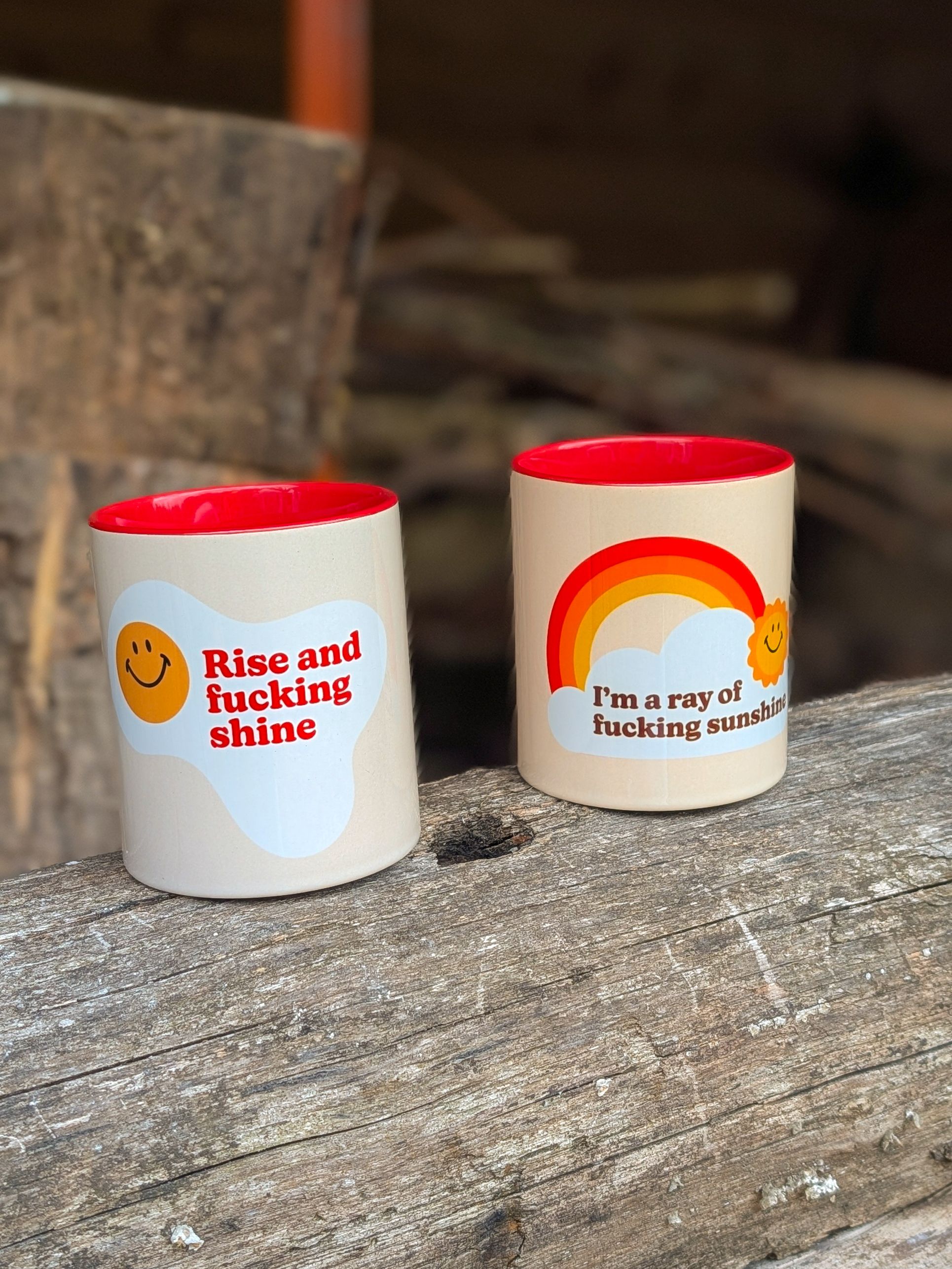 A hand holding a print showing colourful beach huts