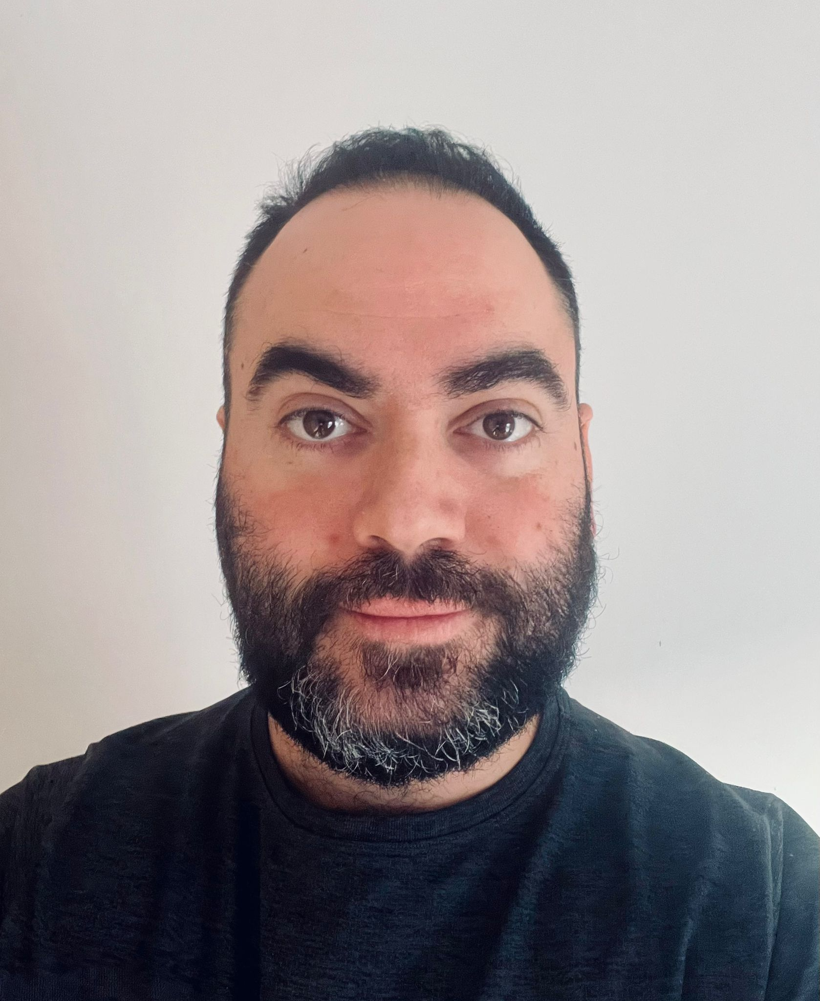 A profile photo of Dan Tahmassebi, the director of TaxReady.