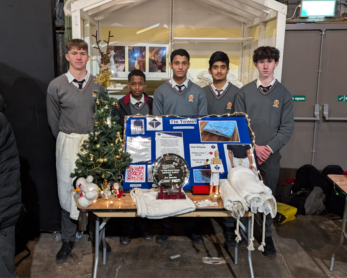 tie towel team at their stand in marina market with the innovation award