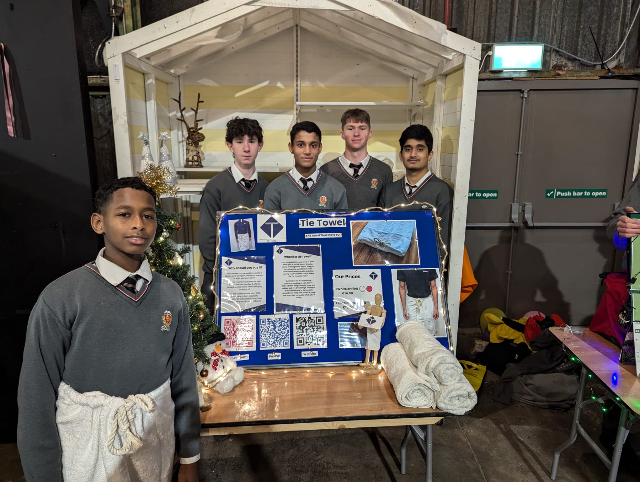 tie towel team at their stand in marina market