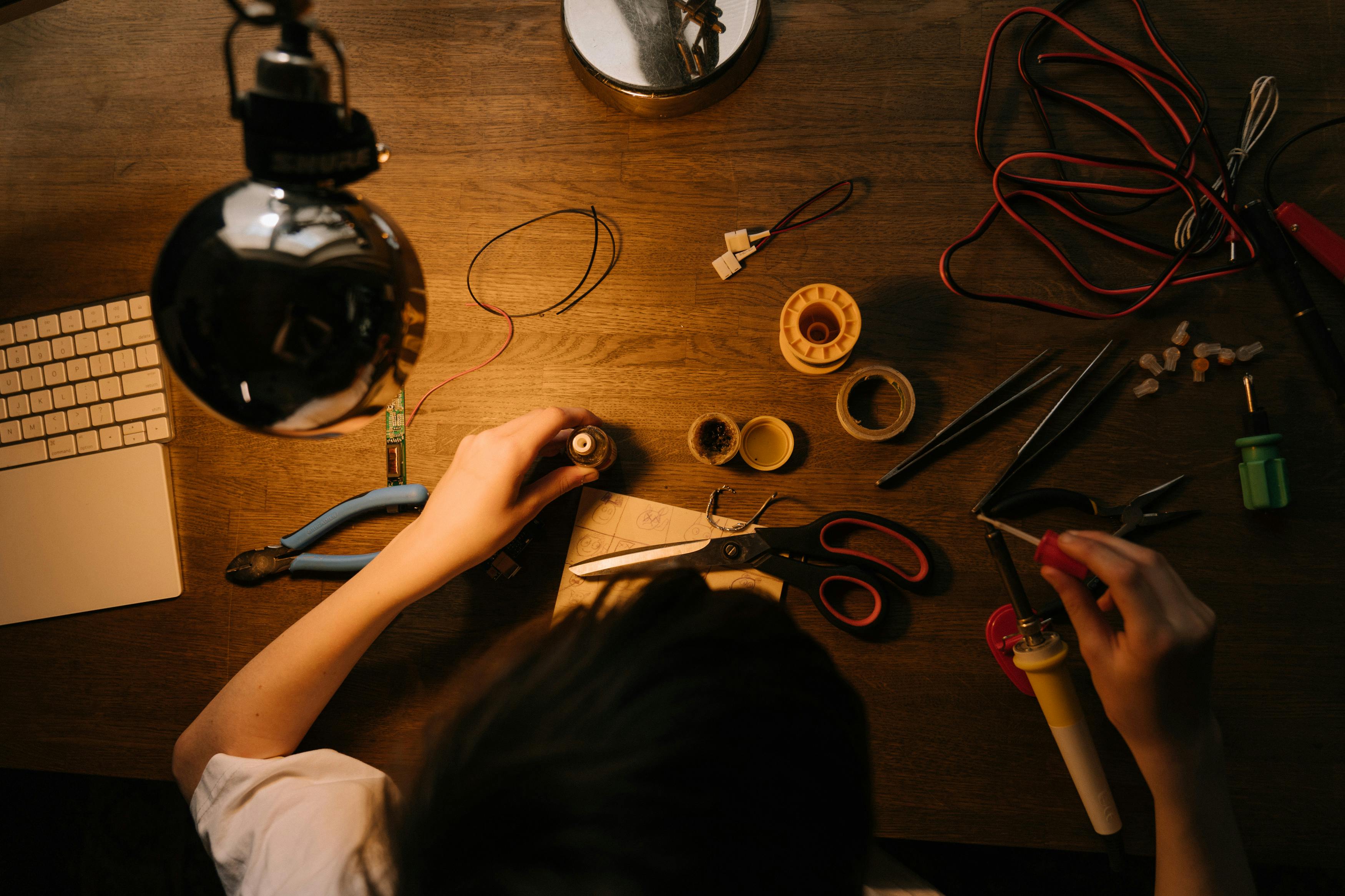 child learning to solder