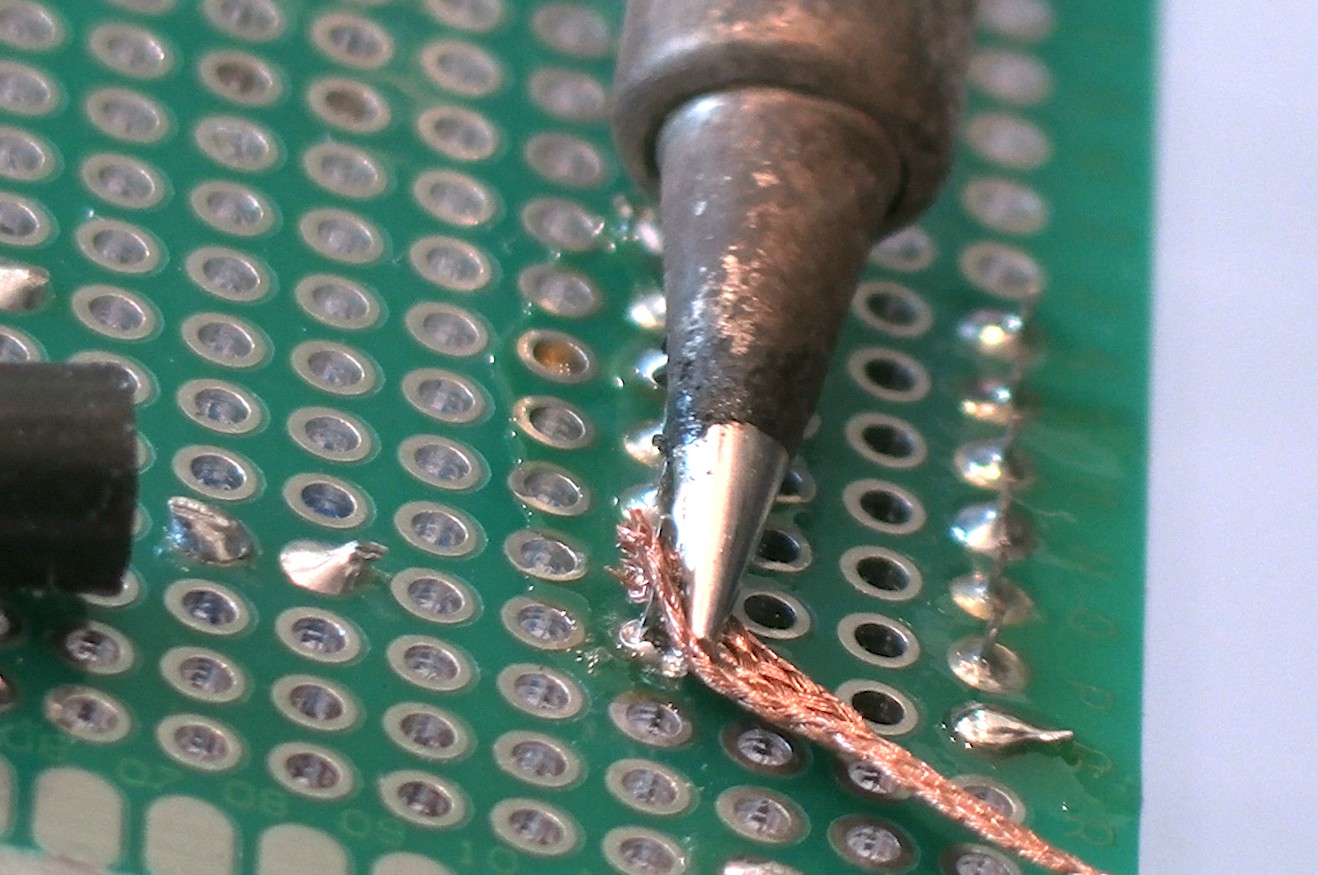 Close-up of desoldering electronics