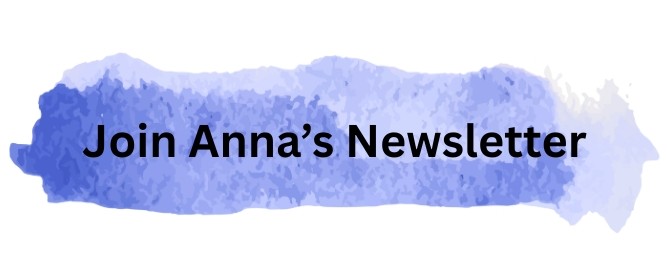 A blue watercolor mark with the words 