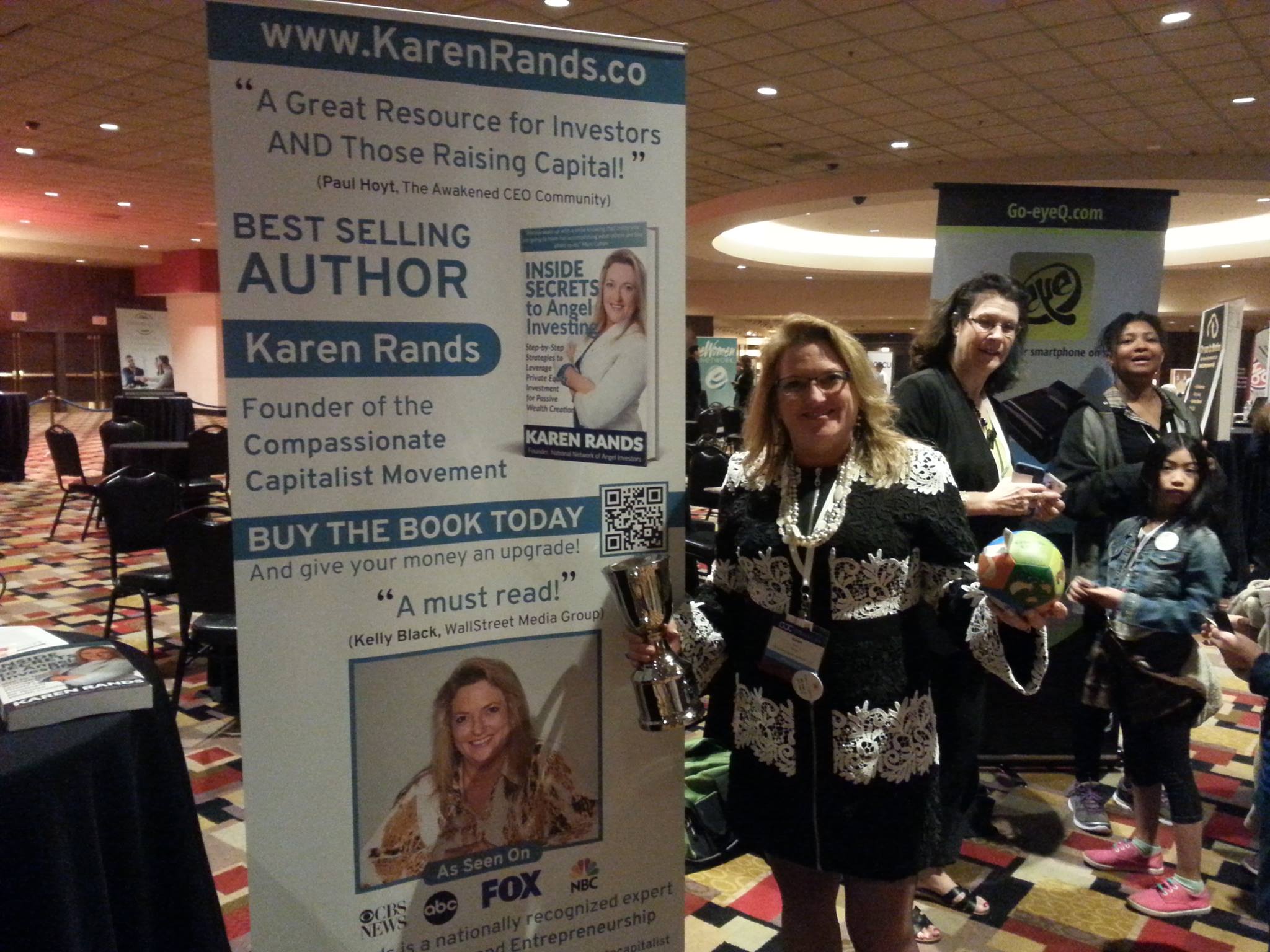 Karen Rands at trade show promoting inside secrets to angel investing