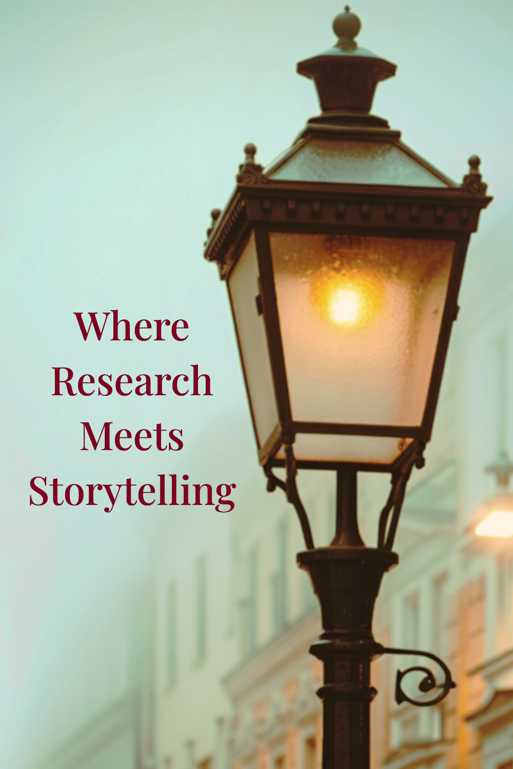 A glowing vintage streetlamp against a misty backdrop of blurred buildings with text: 