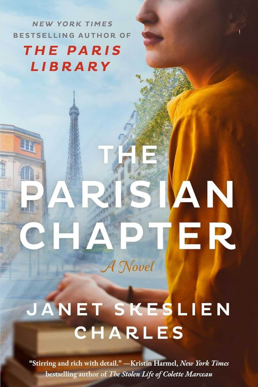 Book cover features a woman in a yellow blouse gazing thoughtfully, with the Eiffel Tower in the background. Title: 