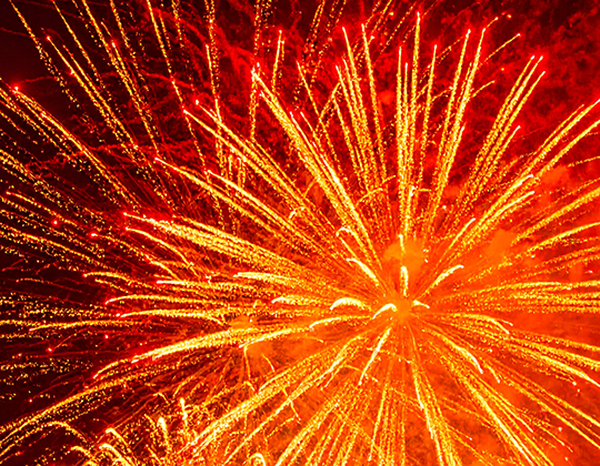 red and orange fireworks picture of a loud noise