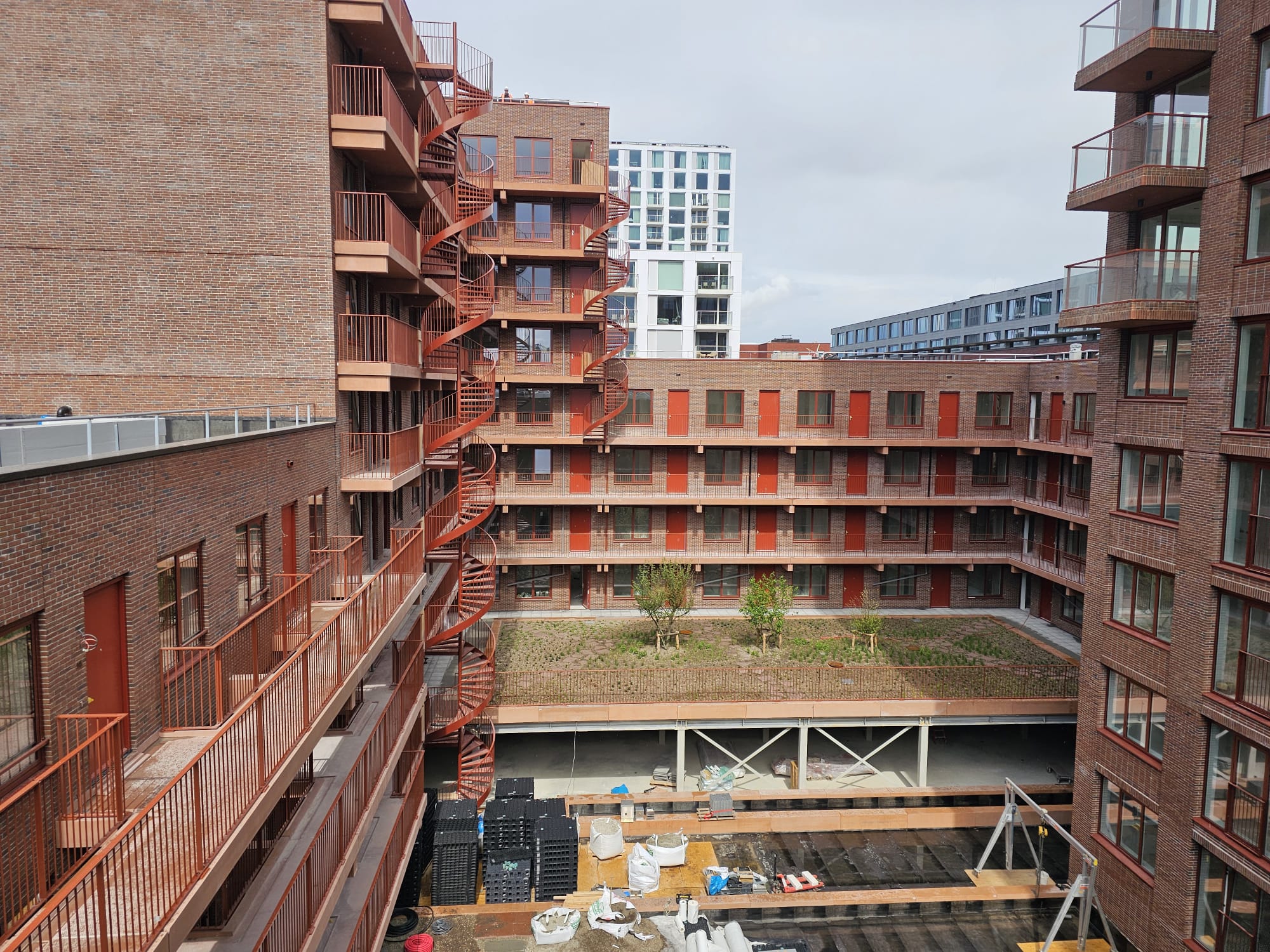 Windows, doors, railing and starcase construction in a new apartmentcomplex