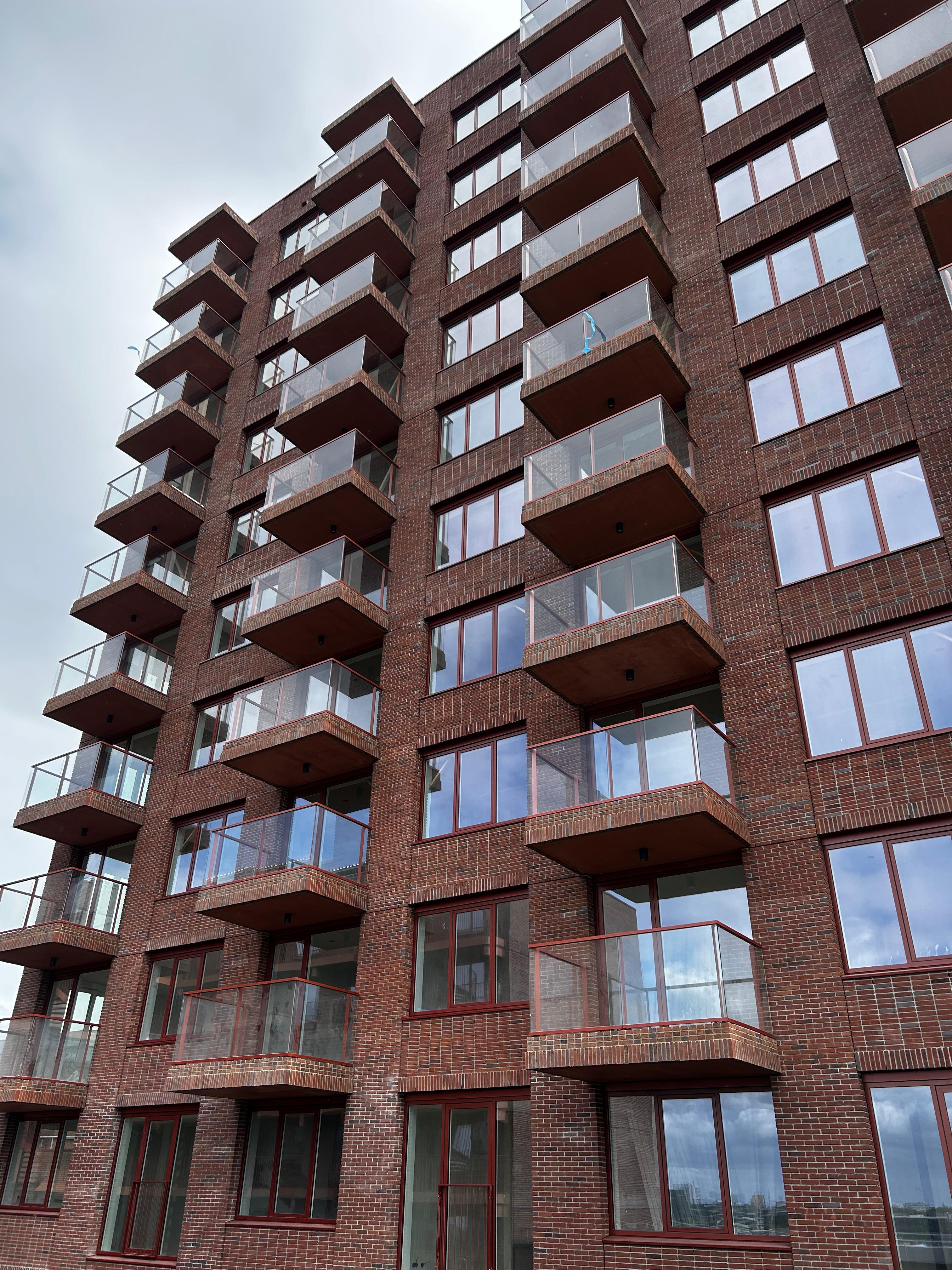 Glass balcony construction in a new apartmentcomplex