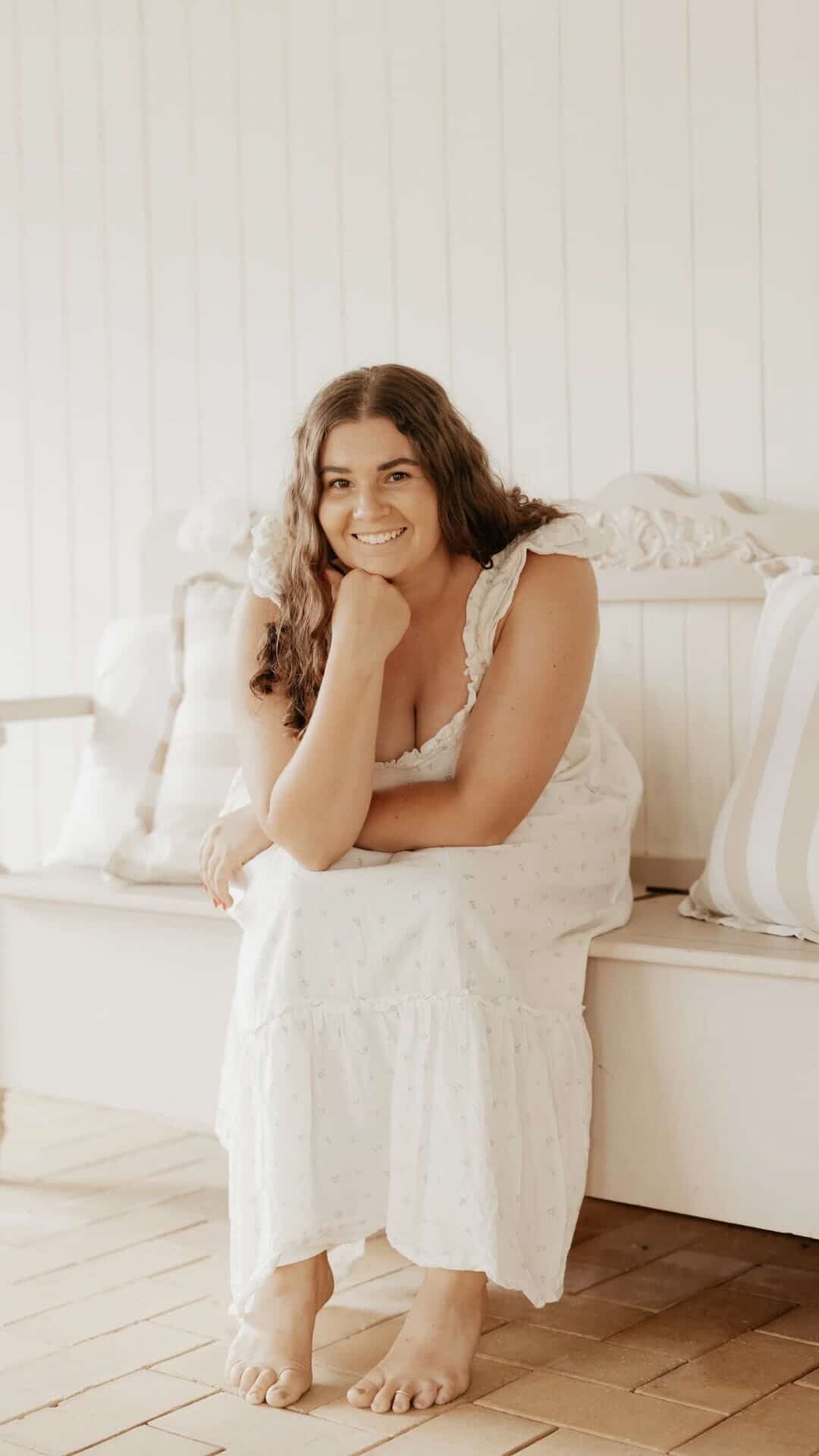 Hannah, founder of Meadow & Soul, seated and looking at the camera