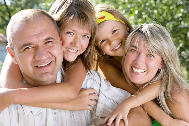 Happy family with a life insurance agent client in apple valley, ca.