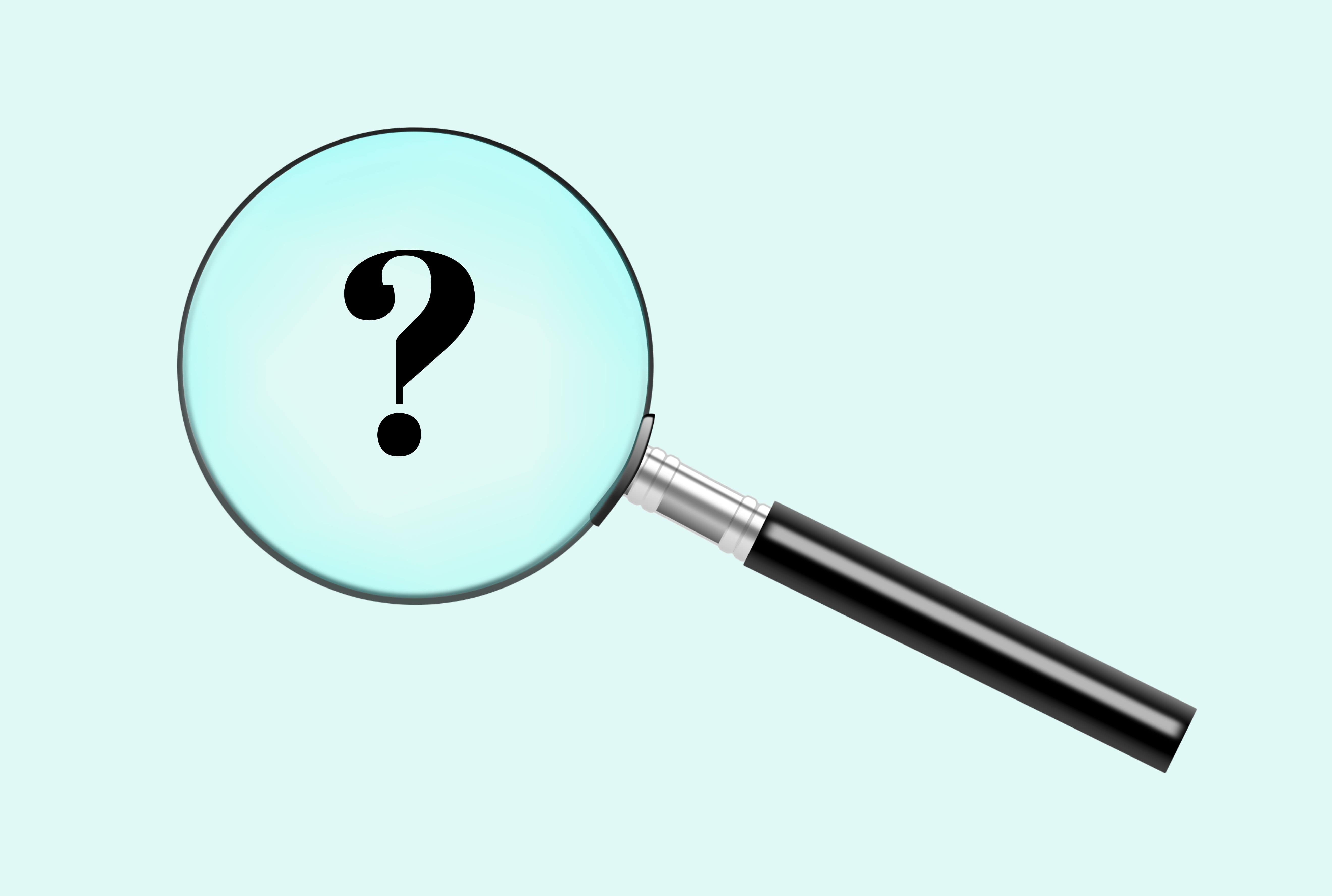 FAQ magnifying glass for a financial advisor.