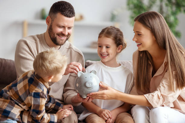 Happy smiling family who saves money with a financial advisor.