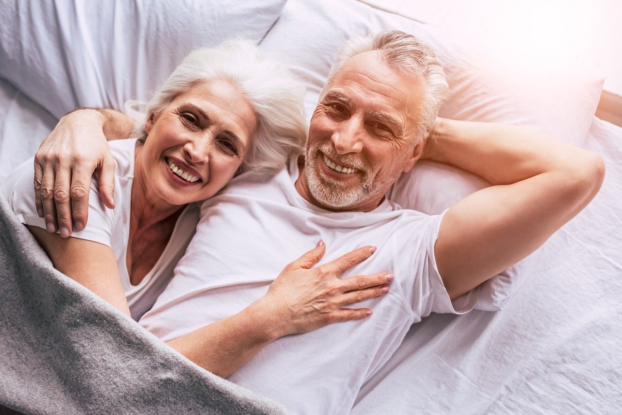 Happy smiling couple who uses the investment services of Financial Advisor Pro in mesa, az.