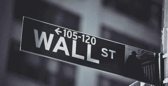 Wall street, street sign that talks about financial services industry is the best for passive income.