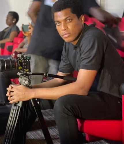 Gidiexposure CEO working on a project ,captured at an event