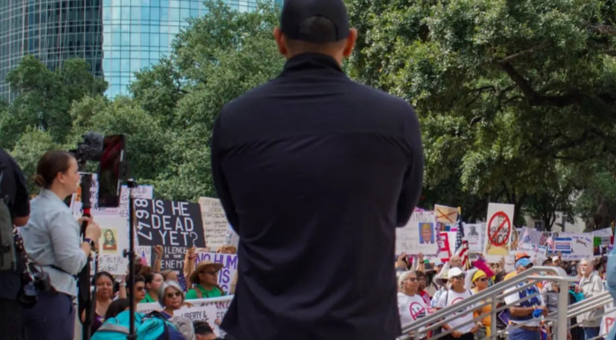Democrat Elected Officials Share Pictures With Violent Protest Sign