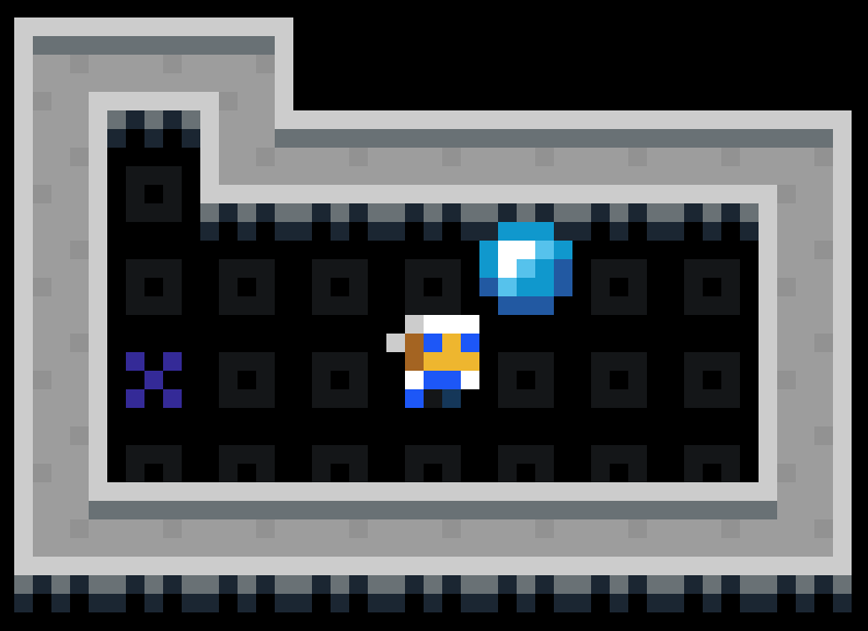 Skyline of Montreal in winter. Skyscrapers with lit up windows and snow on top, trees in the foreground and a blue sky in the background