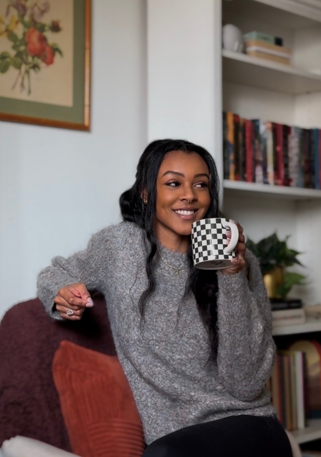 aziza ransome, master of industrial organizational psychology, leadership coach sipping tea in home office