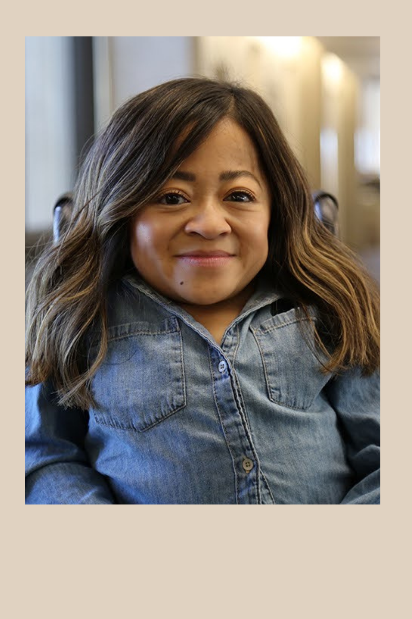 Photo of Teresa Nguyen. She is a young woman with long brown hair. She is wearing a blue denim shirt.