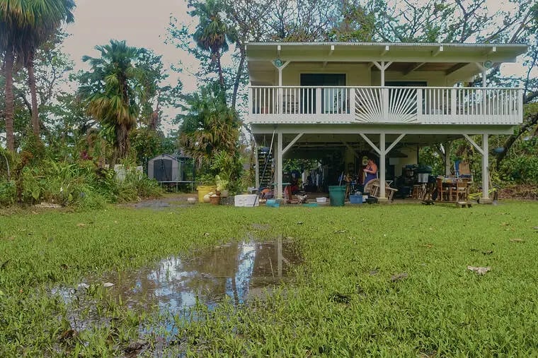 Floodwater on a North Shore property after Hurricane Lowell