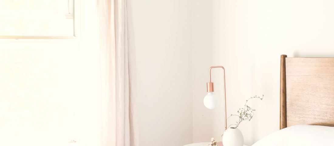 A bright, simple bedroom: seven hours is the floor, and snoring is a test
