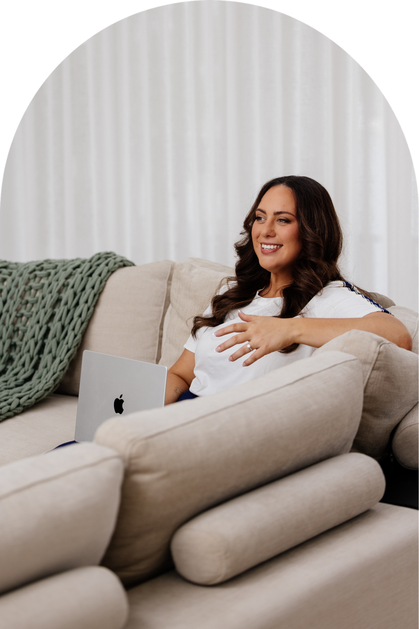female business owner holding and looking at iphone