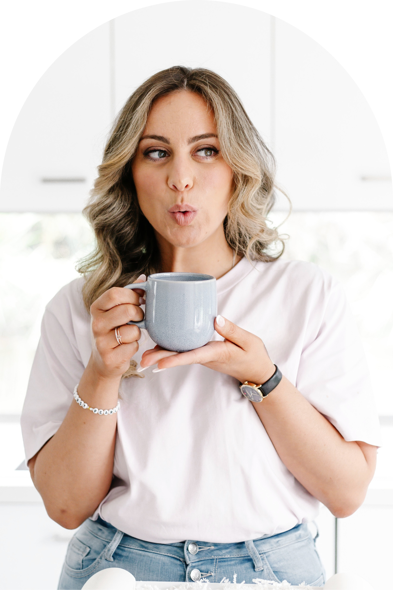 woman holding coffee mug
