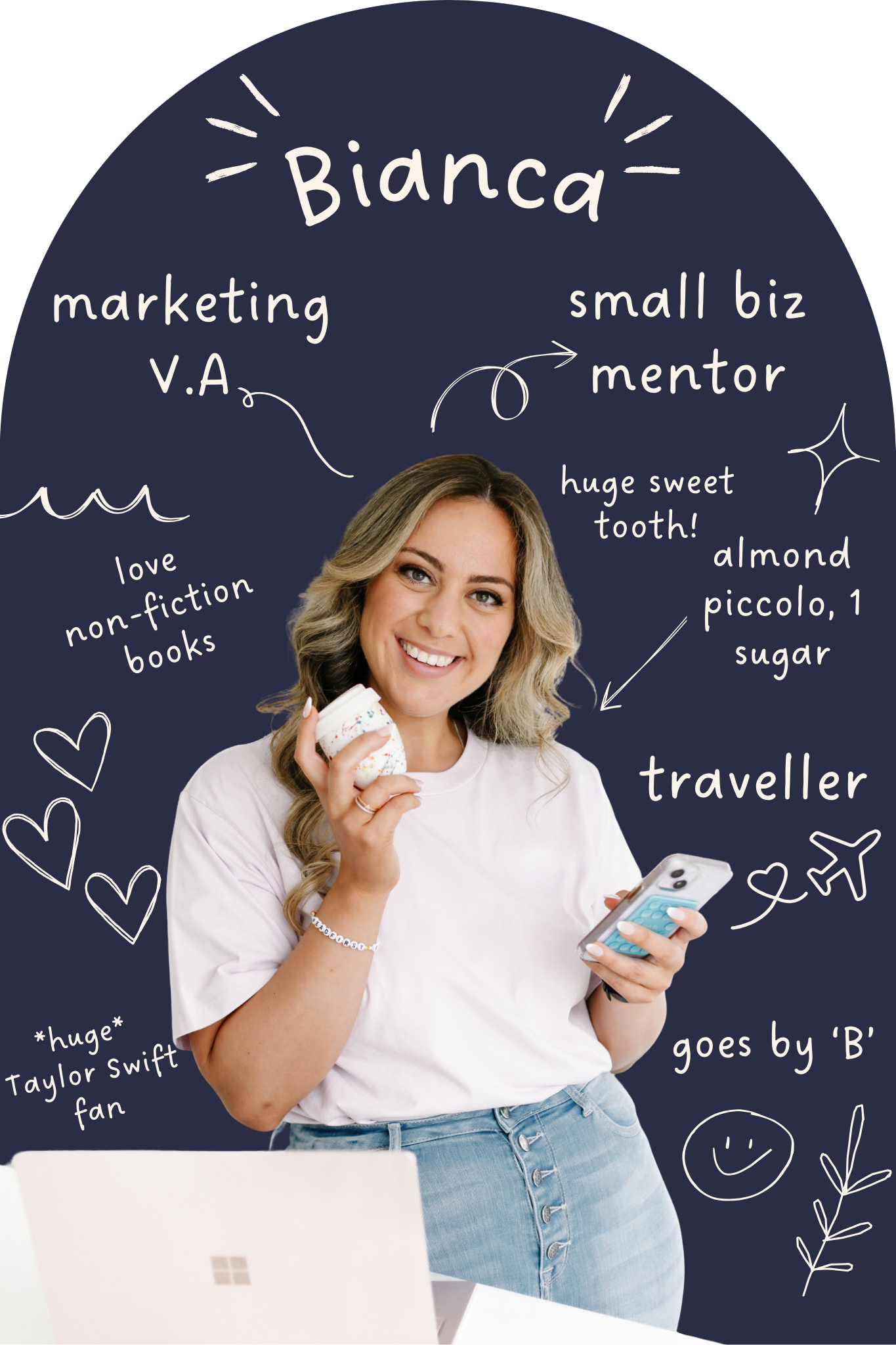 woman standing at bench with laptop on top, holding phone in one hand and a coffee in the other.