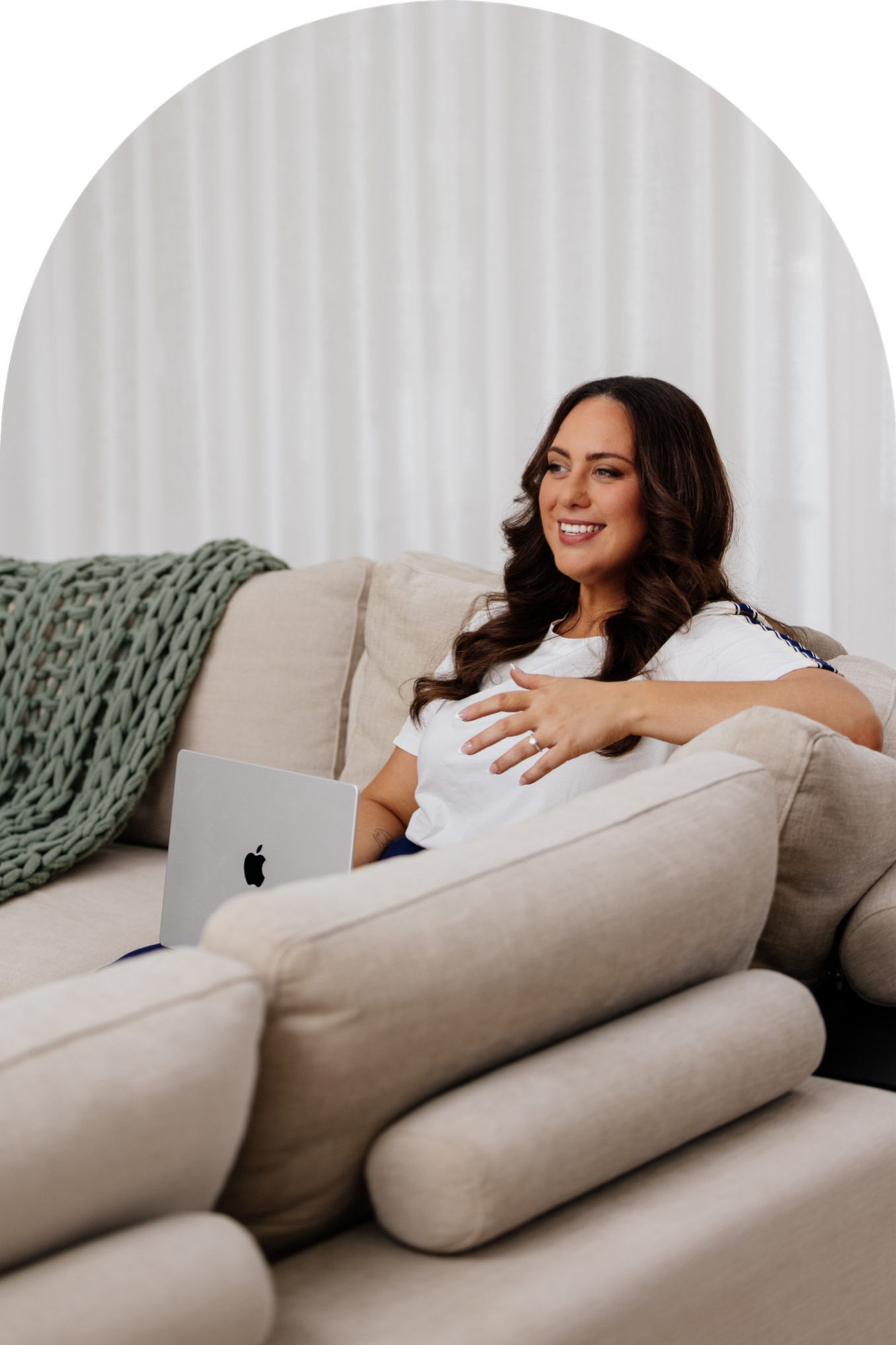 female business owner holding and looking at iphone