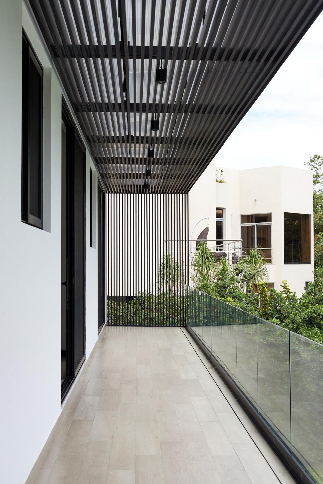 Modern balcony with glass railing