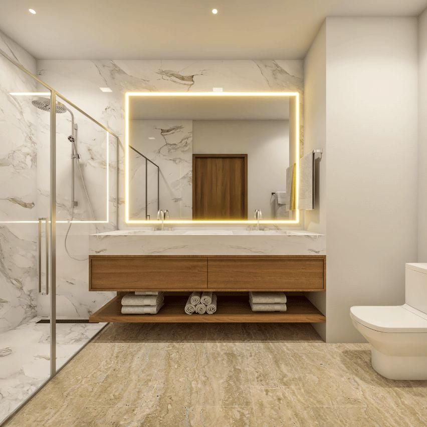 Baño en mármol con doble lavamanos