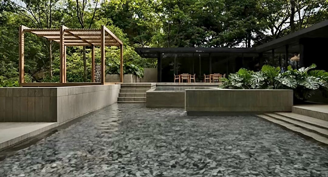 Indoor–outdoor pool with adjacent yoga area