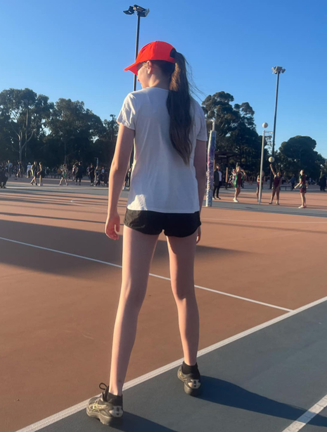 Trainee umpire with red cap