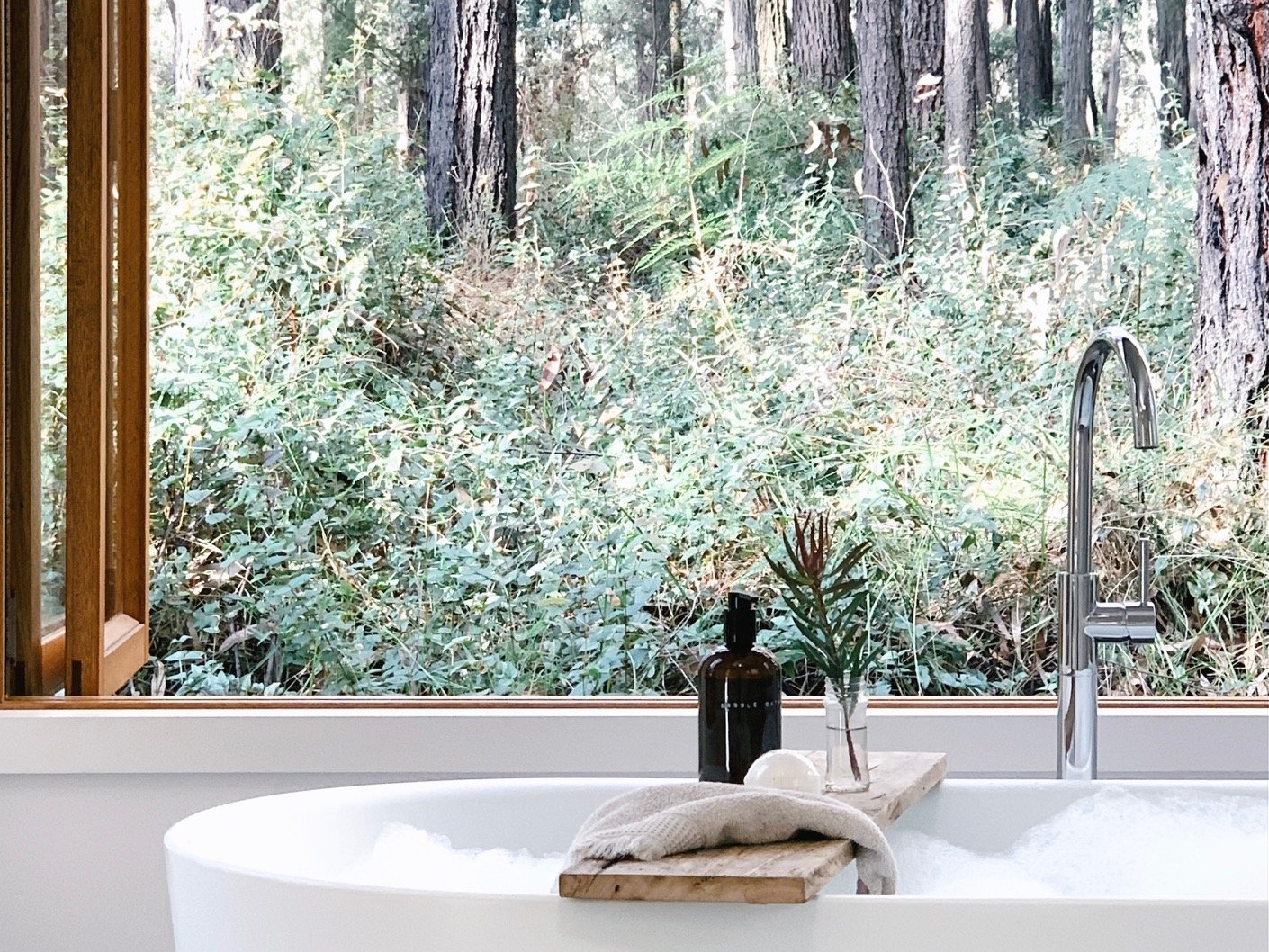 Soaking tub surrounded by native bushland, ideal for digital detox and slow stays in Gembrook