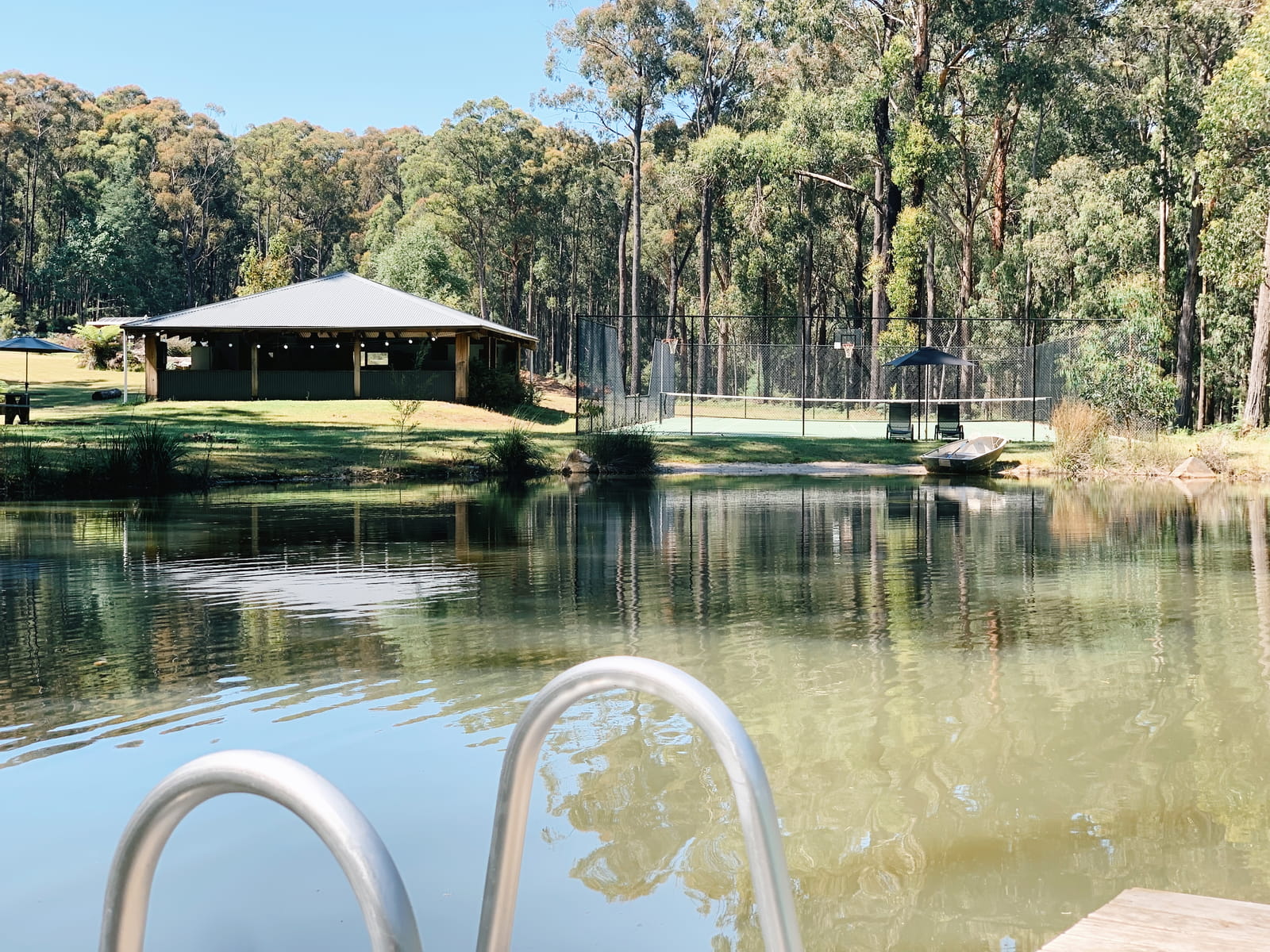 Eco-friendly accommodation near Melbourne with a spring-fed pond and bushland views