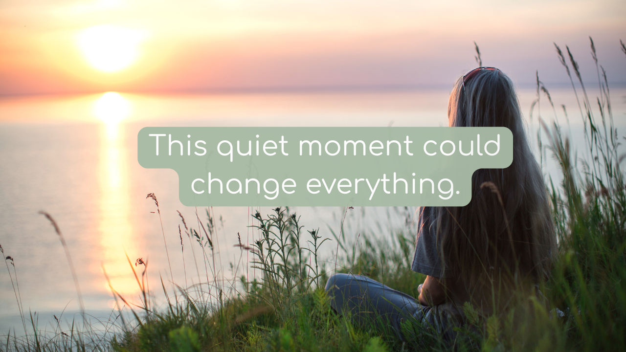 A serene coastal scene at sunset, with soft pink skies and calm ocean waves. A woman stands barefoot on the sand, gazing toward the horizon, evoking a sense of stillness, reflection, and peace. Overlaid text invites the viewer to begin their own sanctuary ritual.