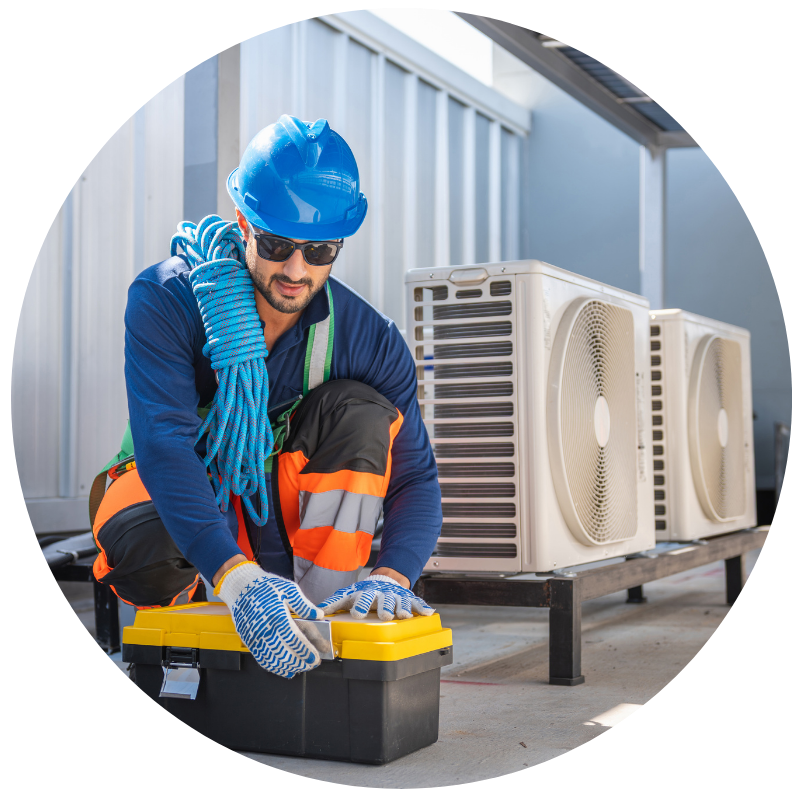 man in a hard hat closing a tool box