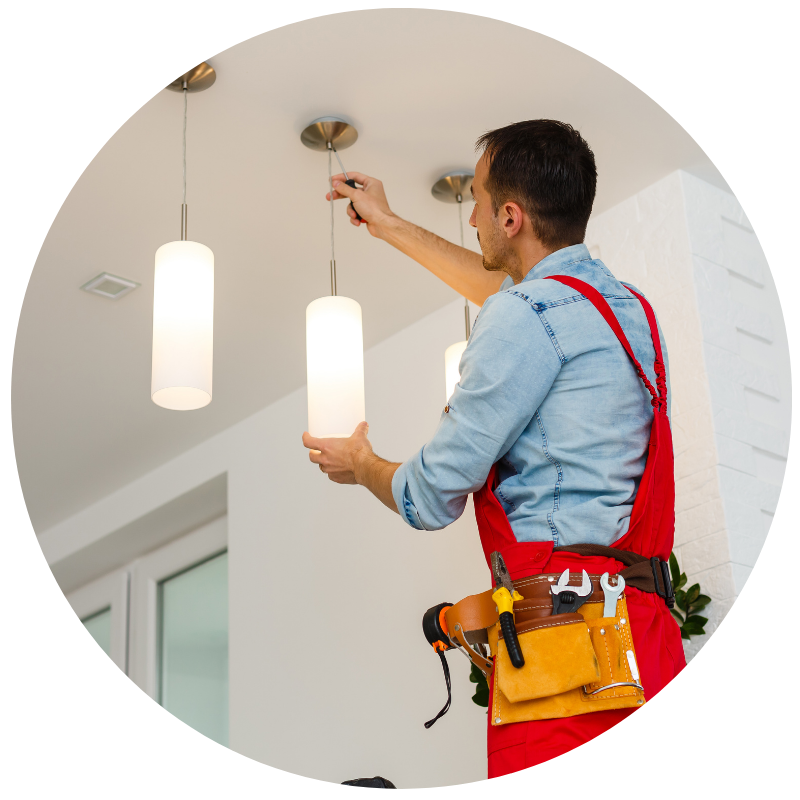 electrician hanging a new pendant light feature