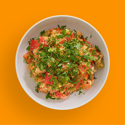 Top-down shot of a plate of Bulgarian scrambled eggs