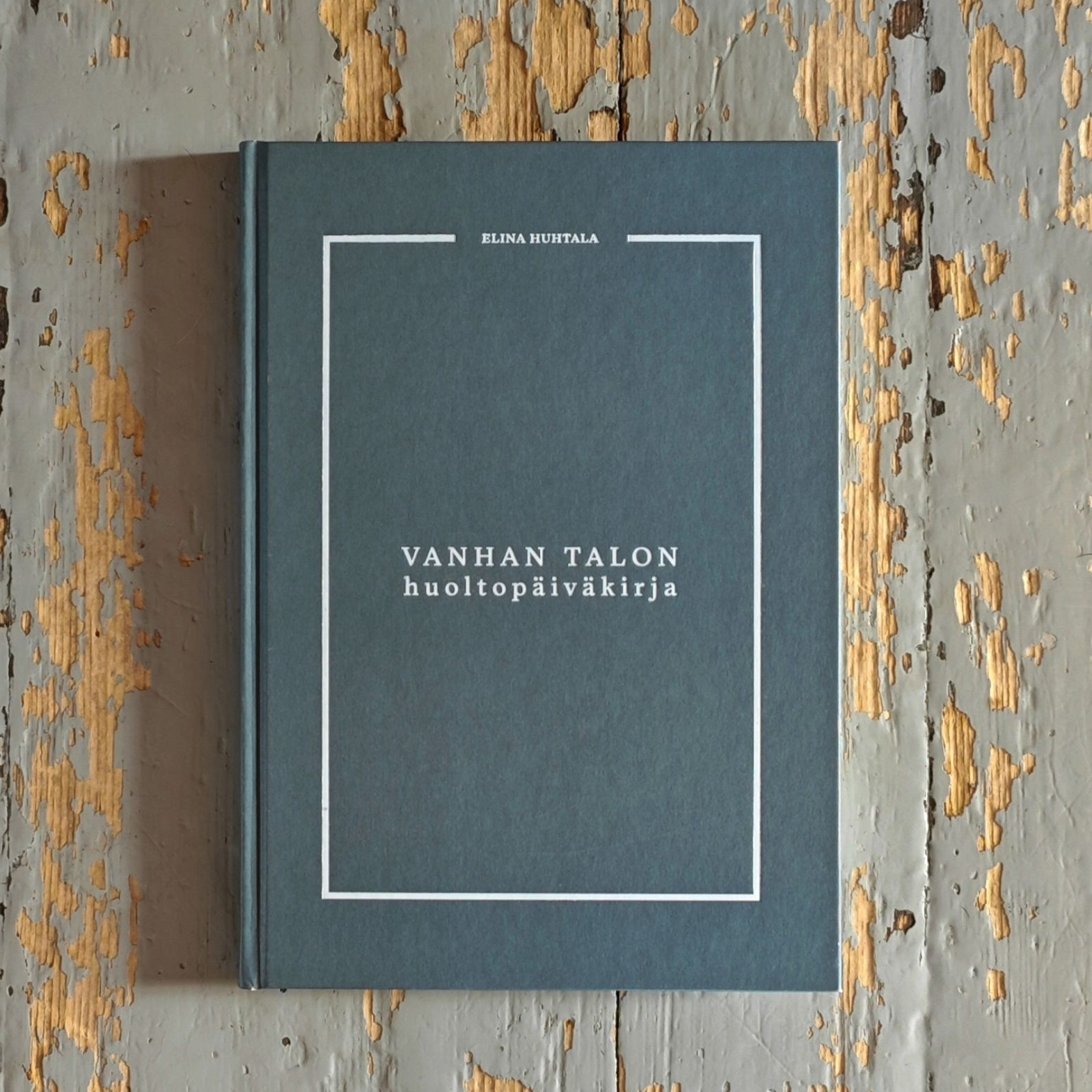 Vanhan talon huoltopäiväkirjan kansi