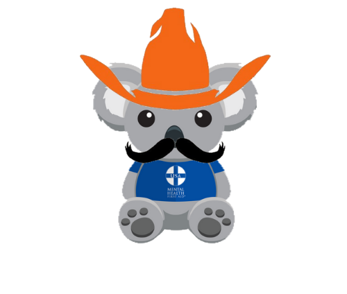 Three Algee stuffed koalas smiling while sitting on a table. Each koala wears a different shirt (one white, one blue, and one orange), representing the different eras of logos.