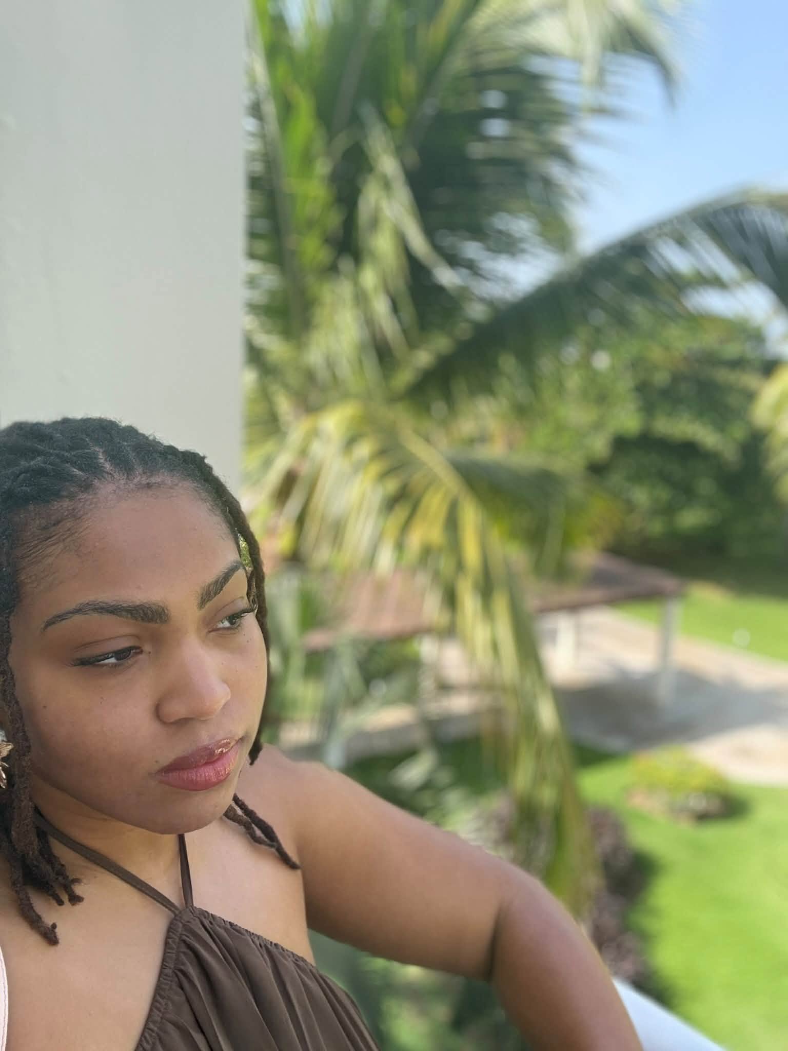 Kailynn on the balcony of the resort